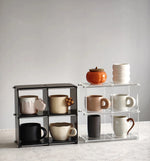 présentoir rangement tasses transparent moderne cuisine support minimaliste pieds accessoires pot gâteau