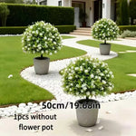 décoration intérieure pot fleurs artificielles rouges blanches feuilles vertes moderne