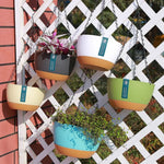 pots suspendus modernes plastique noir vert beige bleu unis opaques crochet