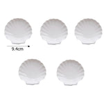 assiettes blanches modernes céramique lisses rangement présentation alimentaire set tailles différentes