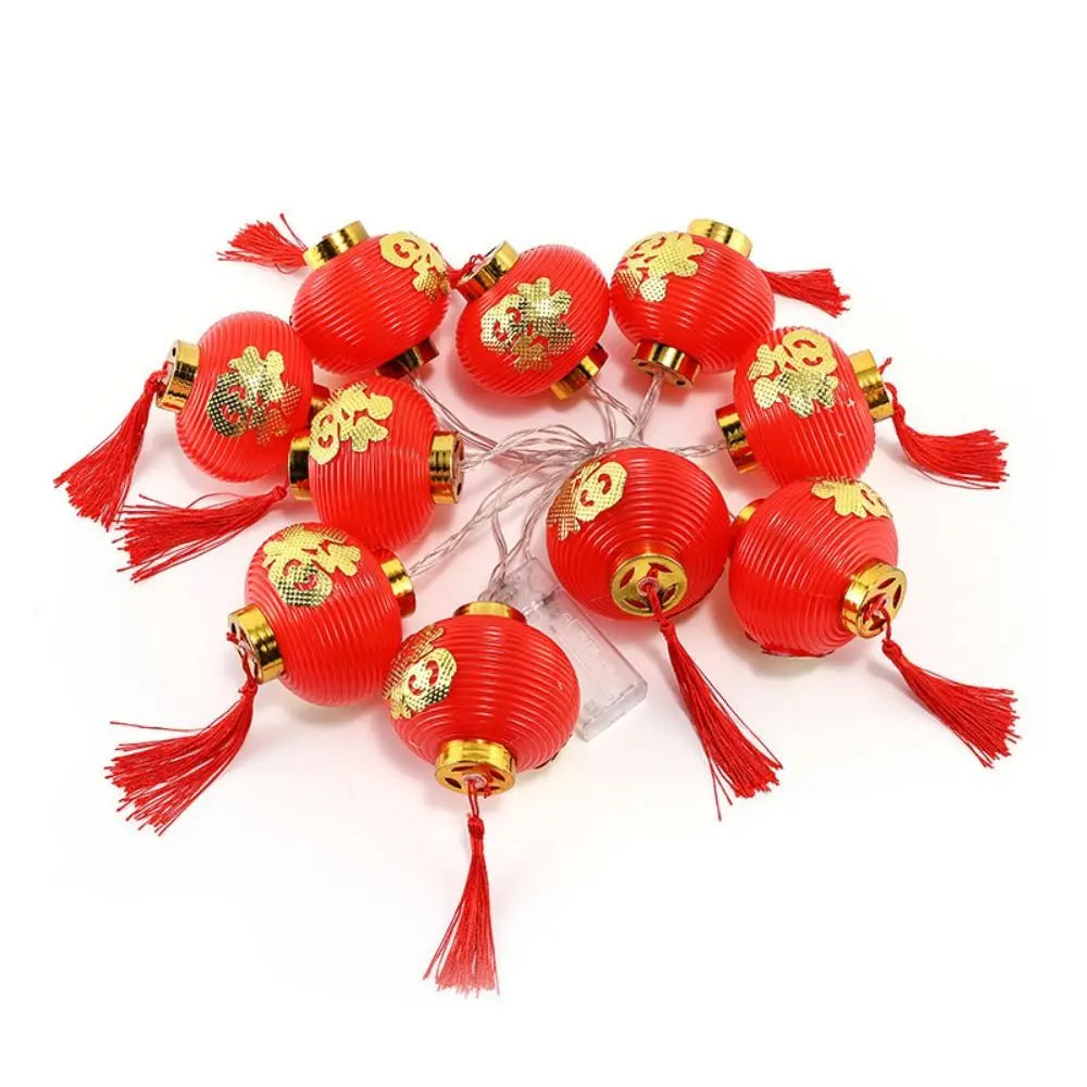 lanternes chinoises traditionnelles rouge ornements dorés franges clips guirlande lumiere led nouvelle an fete