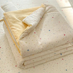 couette d'été légère enfant beige motifs fleurs feuilles coton doux décorative chambre enfant