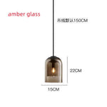 suspension lumineuse moderne transparente dorée ampoule câble noir minimaliste salle manger chambre