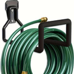 support mural tuyau arrosage robuste noir vert fixations vis mur utilitaire rangement outils fonctionnel