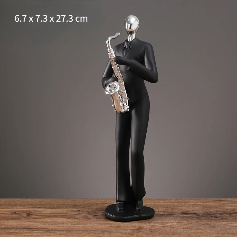 statue musicien moderne abstraite saxophone guitare noire décoration intérieure couple instrumental résine opaque base