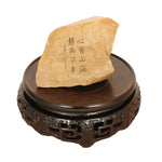 support circulaire bois sculpté artisanal traditionnel marron foncé détails complexes vase plantes décoration maison