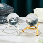 base présentation boule cristal or argent branches stylisées moderne decoration maison
