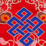 serviettes traditionnelles multicolores brodées motifs floraux géométriques opaques