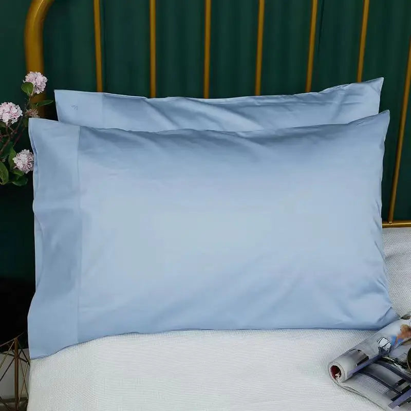 taies d'oreiller coton unies 50x90cm bleu clair moderne non toxique écologique adhésif maison hospitalière