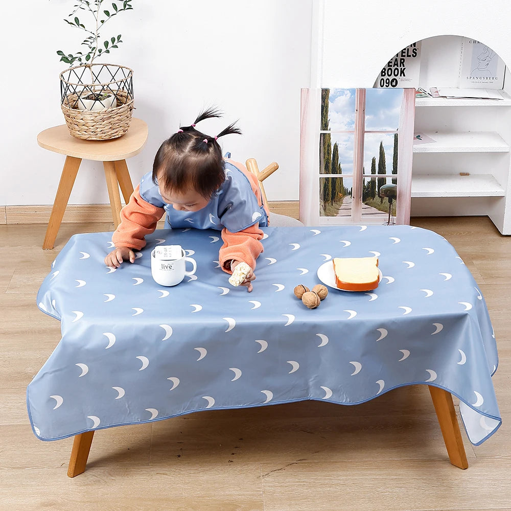 tapis imperméable moderne bleu clair motif lunes blanches 130cm 130cm réutilisable pratique