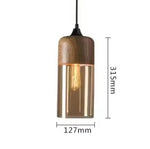 suspension lumineuse moderne pendentif verre noir transparent contemporain fixation câble luminaire salle manger chambre