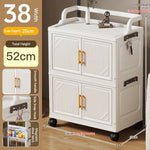 meuble rangement pliable blanc roulettes portes poignées dorées vêtements