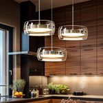 suspension lumineuse moderne trois abat jours argentés abat jours transparents éclairage led salon chambre