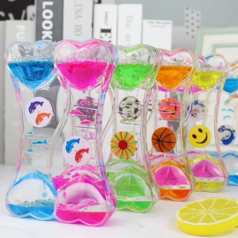 minuteur sablier liquide bicolore transparent motifs géométriques souriant deco moderne