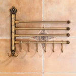 porte serviettes pivotant bronze antique ornements dorés classique vintage mural serviettes fixations visibles