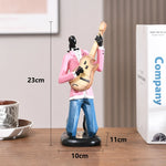 statues miniatures musiciens guitare saxophone trombone batterie décoration intérieure moderne stylisée