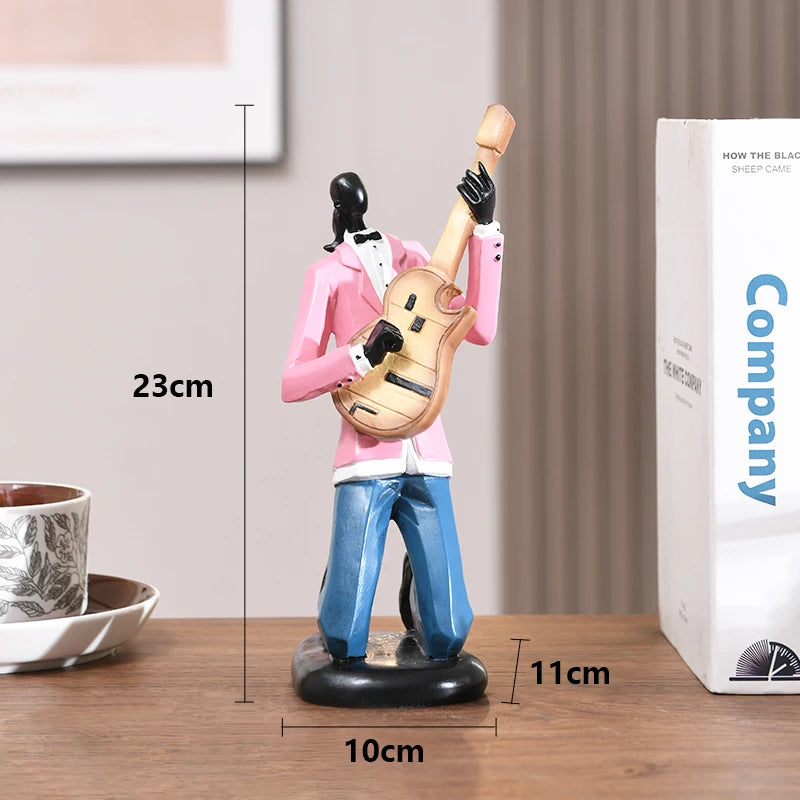 statues miniatures musiciens guitare saxophone trombone batterie décoration intérieure moderne stylisée
