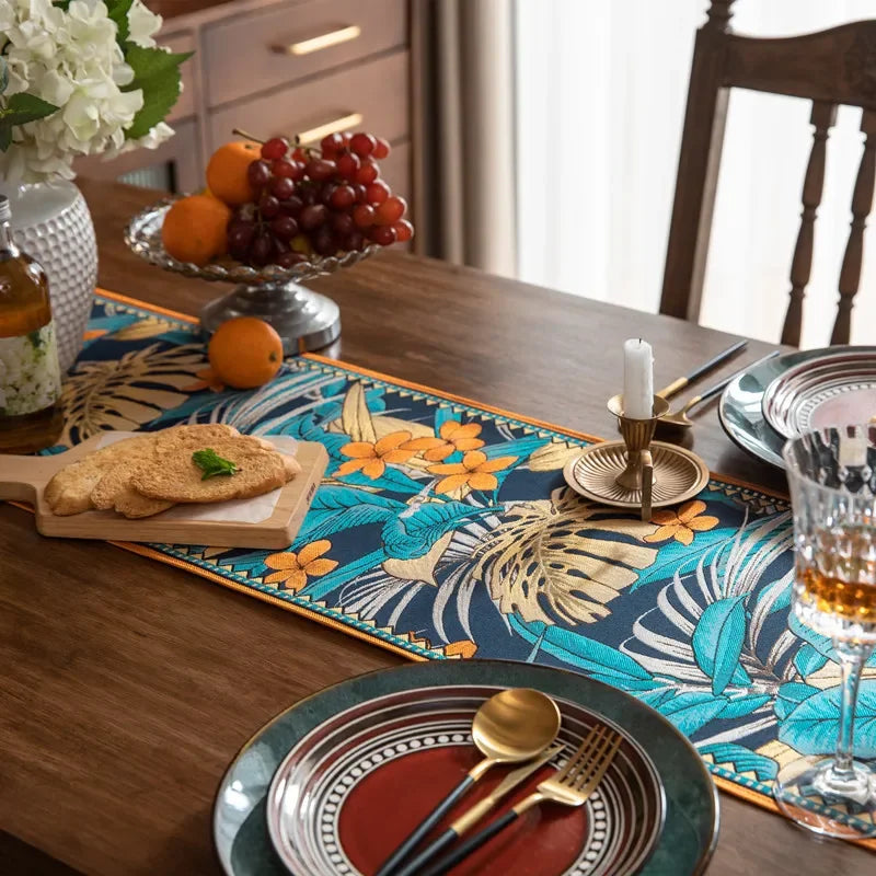 nappe bohème motifs floraux franges couleur bleu foncé orange verte marron rustique