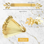 décoration table feuilles dorées élastiques serviettes occasion fête classique doré napkins rings evento deco