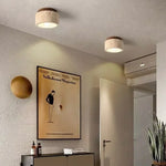 lampe moderne bois beige brun foncé texture granulée lumière chaude neutre blanc