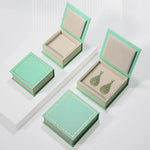 boîtes bijoux classiques bordure dorée motifs floraux opaques vert clair rose pâle jaune clair