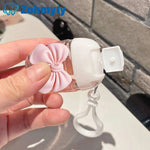 flacon gel hydroalcoolique transparent rose ruban noeud clip moderne rechargeableextérieur