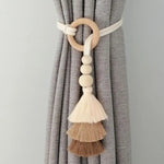 boucles rideau bois pompons tissus beiges marrons boho chic anneaux décoration maison