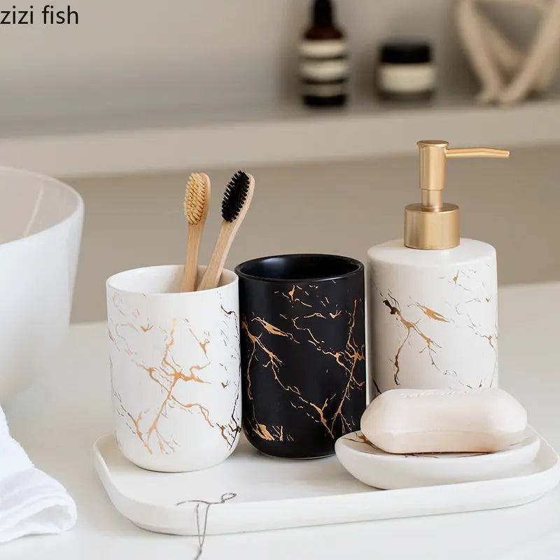 ensemble salle bain moderne blanc doré marbre veines élégant pompe tasse dents support savon