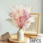 bouquet plumes graminées fleurs séchées blanc rose boho décoration intérieure anniversaire mariage