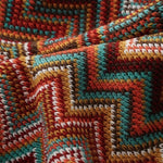 couverture plaid bohème ethnique rouge orange marron turquoise beige zigzag franges adaptable maison