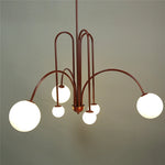 lustre moderne rouge noir doré sphères blanches opaques suspension salon chambre
