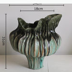 vase moderne artisanal transparent rayures verticales rouge blanc texture rugueuse décoration table arrangement floral