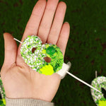 bougies numériques forme chiffres anniversaire verte blanche jaune feuilles