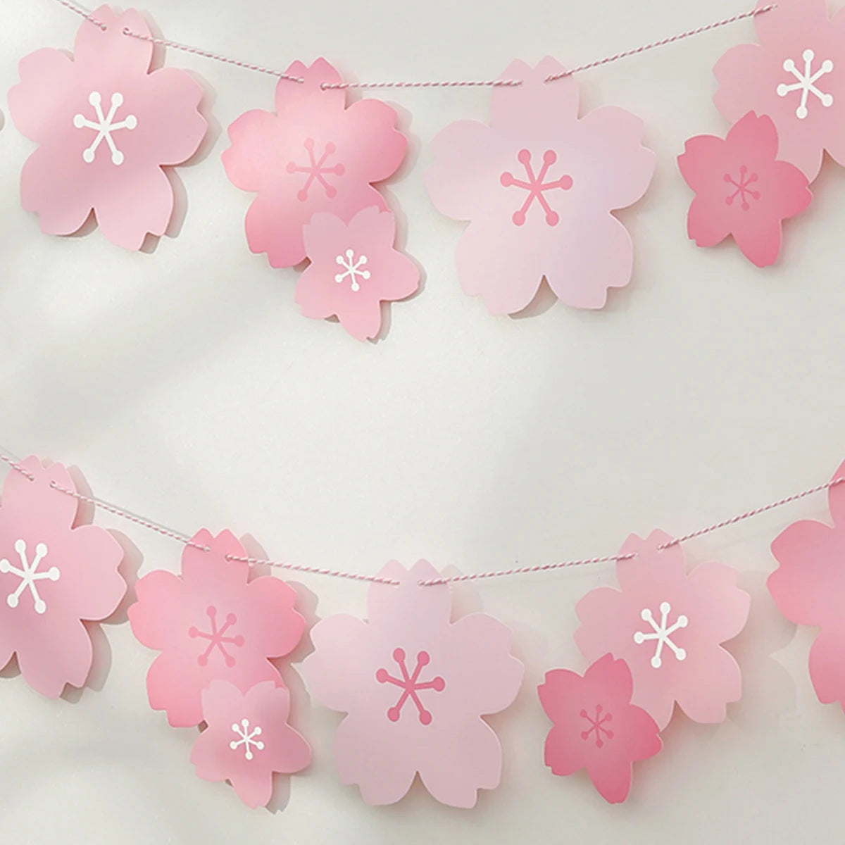 guirlande décorative fleurs cerisier papier rose blanc festif japon gradient