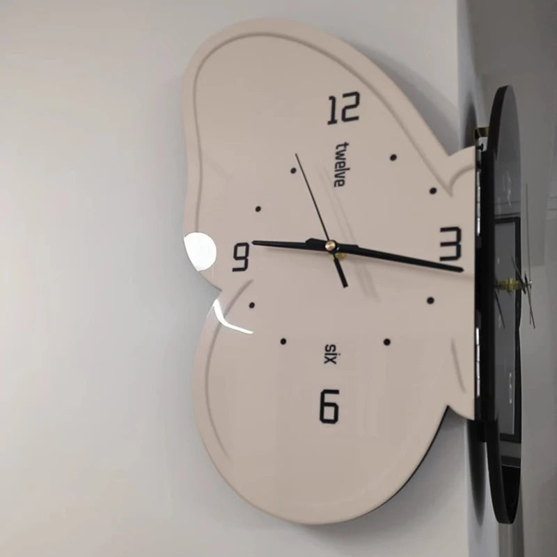 horloge murale moderne aiguille lumineuse papillon noir blanc salon résine