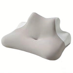 coussin cervical mousse mémoire forme bleu clair texture ergonomique alignement colonne vertébrale relaxation sommeil