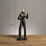 statue musicien moderne abstraite saxophone guitare noire décoration intérieure couple instrumental résine opaque base