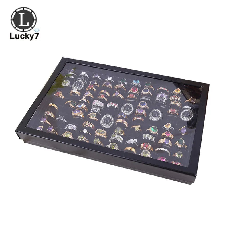 boîte bijoux moderne noir bleu jaune transparente 100 positions exposant anneaux sponge velvet packaging