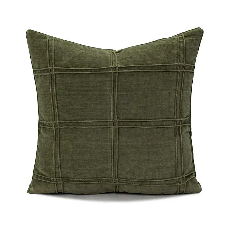 coussin vert olive rayures moderne décoration intérieure blanc motif géométrique noir plissé