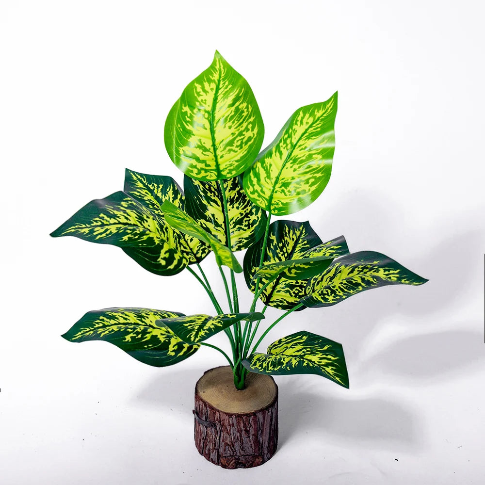 plantes artificielles monstera vert feuilles larges modernes decoration exterieure tronc bois pot ceramique