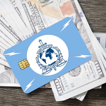 stylo bille bleu interpol logo globe épée carte bancaire
