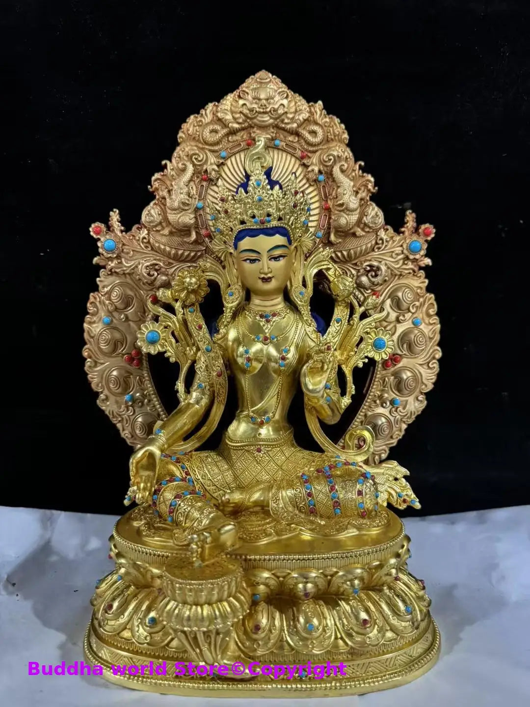 statue bouddhiste or bleu rouge turquoise décoration florale tibétain multiple bras base lotus