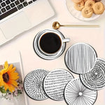 coasters bois blanc rayures noires spirales modernes décoration intérieure 14+