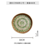 plateau rond rotin coquillages feuilles naturelles décoration boho assiette fruits pain petit déjeuner