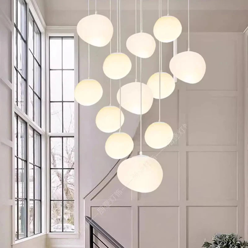Vue rapprochée des différentes couleurs de corps disponibles pour le lustre