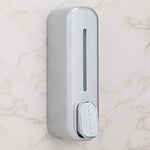 distributeur savon liquide mural blanc doré moderne adhésif bouton déclenchement fenêtre remplissage minimaliste