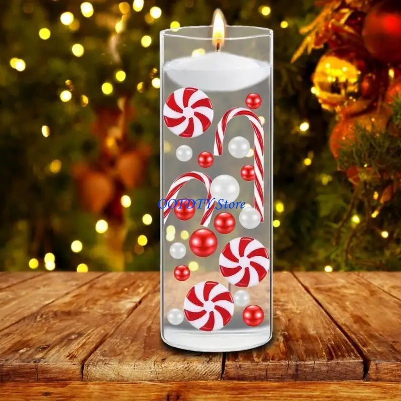 bougies flottantes noel transparentes cannes sucre boules rouges vertes blanches