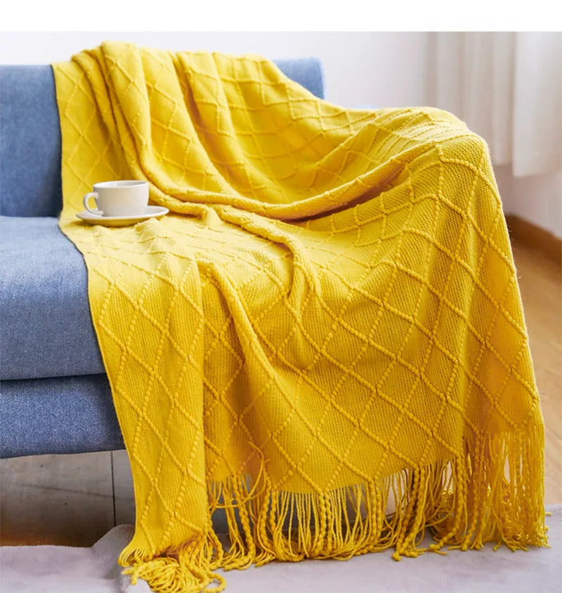 couverture tricotée vert foncé motif zigzag pompons canapé lit décoration intérieure moderne large