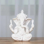 statue ganesha résine sculptée traditionnelle décoration intérieure beige clair blanc cassé religieuse