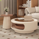 table basse moderne verre transparent plateau rotatif compartiment trois sections couleur beige marron clair